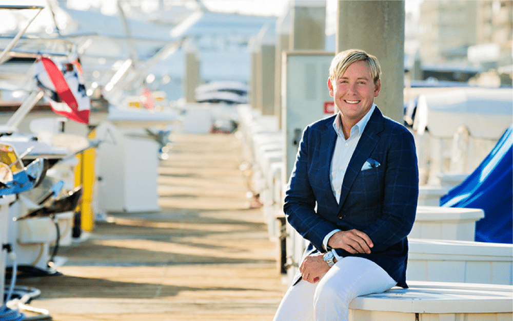 Designer Barclay Butera on a dock